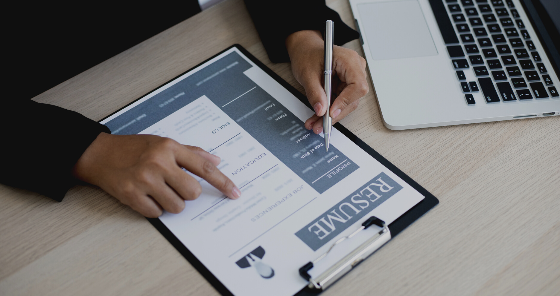 Human Resources Manager Reviewing a Resume
